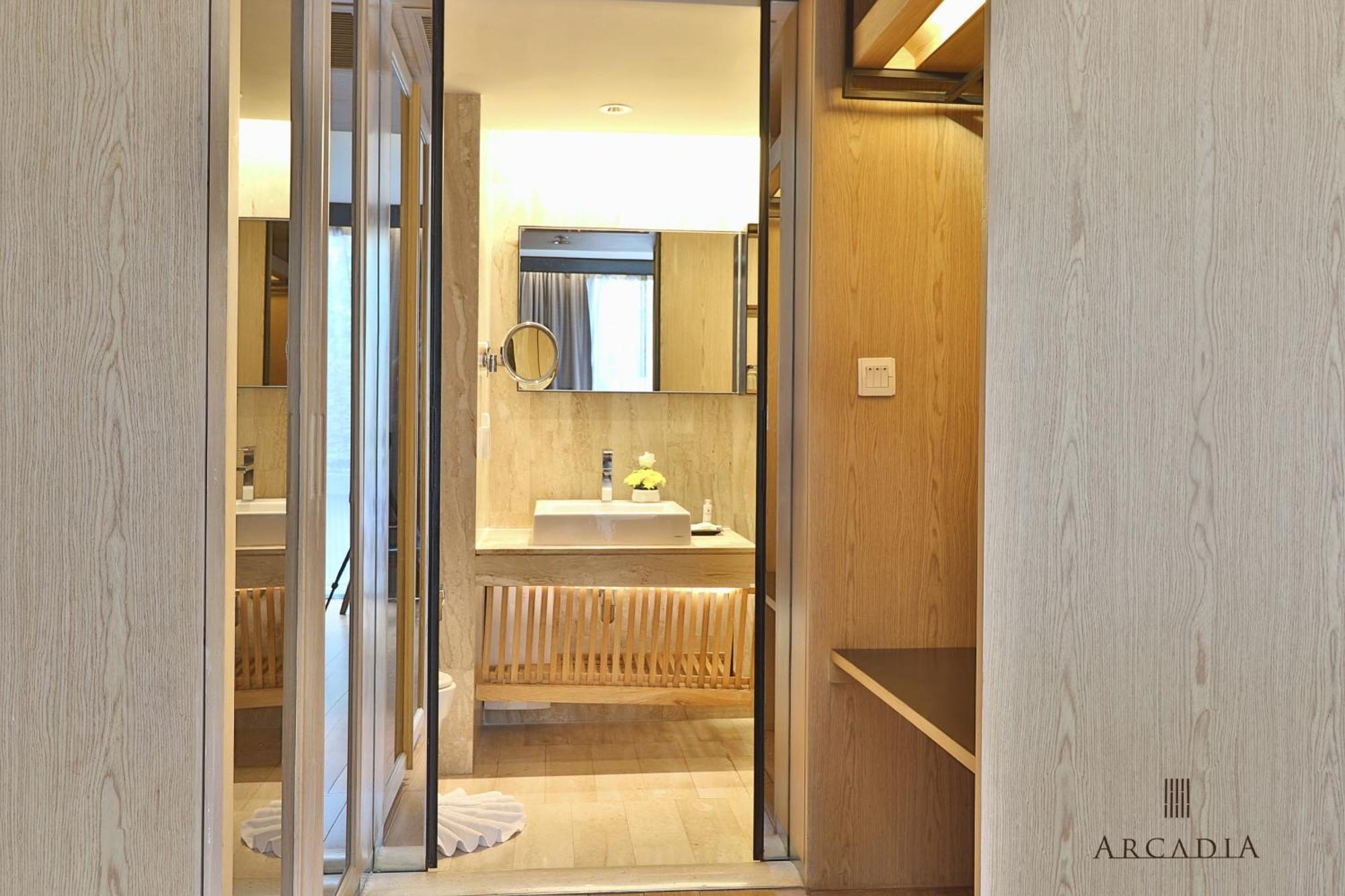 Arcadia Suites Bangkok Quarto foto